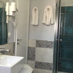 Hotel Costazzurra Museum & Spa Агридженто ванная