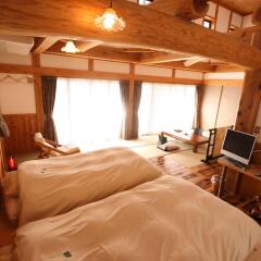 Отель Yamakawa Onsen Ryokan Yotsuba Минамиогуни комната для гостей фото 2