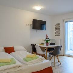 Апартаменты FeelGood Apartments Seestadt Green Living Вена комната для гостей фото 5
