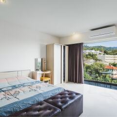 Отель Condo in Karon in Chic Condo (Unit B603) комната для гостей