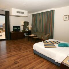 Отель Golden Tulip Aqaba комната для гостей