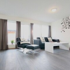 Отель Flotmyrgården Apartment Hotel Норвегия, Гаугесунн - отзывы, цены и фото номеров - забронировать отель Flotmyrgården Apartment Hotel онлайн интерьер отеля