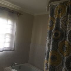 Отель Captain's Cove Beach Resort & Villas ванная