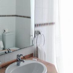 Отель Aparthotel Calema Avenida Jardim ванная