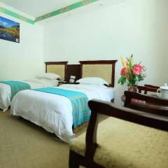 Jiuzhaigou Tang Zhong Hotel комната для гостей