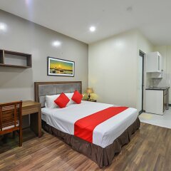 Отель Suji Residence сейф в номере