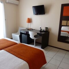 Central Hotel Cayenne in Cayenne, French Guiana from 130$, photos, reviews - zenhotels.com room amenities