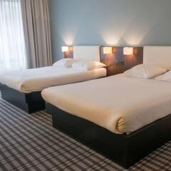 Отель PREMIER SUITES PLUS Antwerp комната для гостей фото 3
