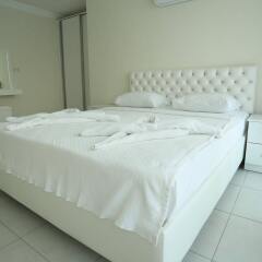 Апартаменты Orka Royal Hills Apartment Олудениз комната для гостей фото 3