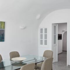 Отель Eden Villas By Canaves Oia Греция, Остров Санторини - отзывы, цены и фото номеров - забронировать отель Eden Villas By Canaves Oia онлайн интерьер отеля