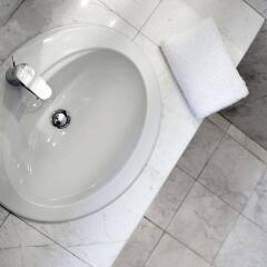Отель Gatto Perso Luxury Apartments Греция, Салоники - отзывы, цены и фото номеров - забронировать отель Gatto Perso Luxury Apartments онлайн ванная