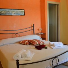 Отель B&B Delle Rondini Альберобелло сейф в номере