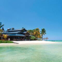 Отель Heritage Le Telfair Golf & Wellness Resort пляж