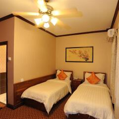 Lao Home Hotel комната для гостей