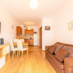 Апартаменты Victus Apartments комната для гостей