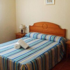Отель Hostal las Parcelas Испания, Кониль-де-ла-Фронтера - отзывы, цены и фото номеров - забронировать отель Hostal las Parcelas онлайн комната для гостей