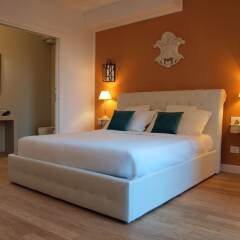 Отель Cosmopolitan Central Rooms Италия, Болонья - отзывы, цены и фото номеров - забронировать отель Cosmopolitan Central Rooms онлайн комната для гостей фото 4