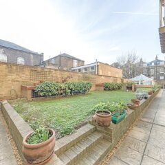 Апартаменты Spacious Apartment in Trendy Islington Лондон
