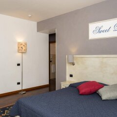 Отель Inn Rome Rooms & Suites Италия, Рим - отзывы, цены и фото номеров - забронировать отель Inn Rome Rooms & Suites онлайн комната для гостей фото 4