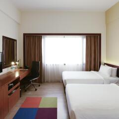 Village Hotel Bugis 4* Улучшенный номер с различными типами кроватей фото 5