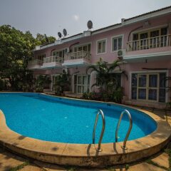 Отель OYO 13345 Home Courtyard Chapora Гоа бассейн