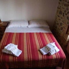 Отель La Pietra Rara B&B Монтоне комната для гостей