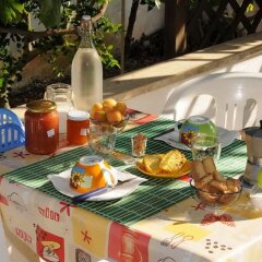 Отель Santu Nicola - Bed and Breakfast Гальяно дель Капо питание