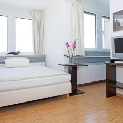 Отель Paragon Apartments Германия, Франкфурт-на-Майне - отзывы, цены и фото номеров - забронировать отель Paragon Apartments онлайн комната для гостей фото 2