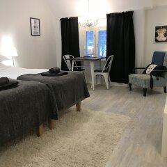 Апартаменты Green Door Apartments Ювяскюля комната для гостей фото 4