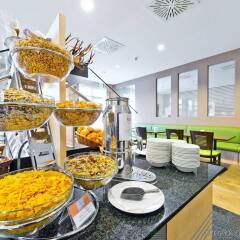 Отель Holiday Inn Express Frankfurt Messe питание фото 2