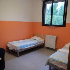 Отель Ostello Due Torri San Sisto Италия, Болонья - отзывы, цены и фото номеров - забронировать отель Ostello Due Torri San Sisto онлайн комната для гостей фото 4