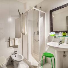 Отель Hibiscus Hotel Residence Италия, Синискола - отзывы, цены и фото номеров - забронировать отель Hibiscus Hotel Residence онлайн ванная