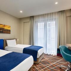 Отель TRYP by Wyndham Istanbul Taksim комната для гостей фото 3