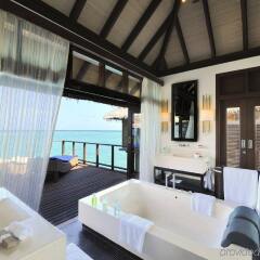 Отель Coco Bodu Hithi Мальдивы, Северный атолл Мале - отзывы, цены и фото номеров - забронировать отель Coco Bodu Hithi онлайн ванная