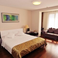 Отель Qingdao Housing International Hotel Китай, Циндао - отзывы, цены и фото номеров - забронировать отель Qingdao Housing International Hotel онлайн комната для гостей фото 3