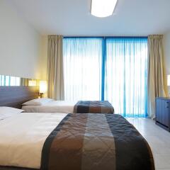 Отель Mercure Rimini Lungomare Италия, Римини - 8 отзывов об отеле, цены и фото номеров - забронировать отель Mercure Rimini Lungomare онлайн комната для гостей