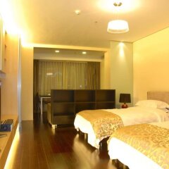 Отель Qingdao Housing International Hotel Китай, Циндао - отзывы, цены и фото номеров - забронировать отель Qingdao Housing International Hotel онлайн комната для гостей
