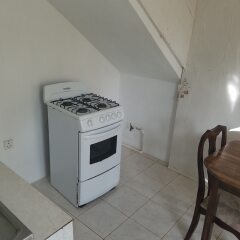 Отель The Cozy Family Inn Guesthouse Ямайка, Порт Антонио - отзывы, цены и фото номеров - забронировать отель The Cozy Family Inn Guesthouse онлайн сейф в номере