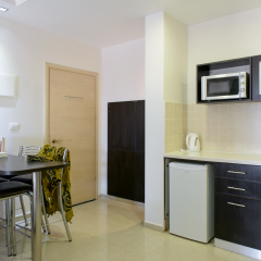Отель Royalty Suites в номере
