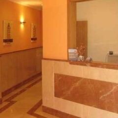 Отель HC Apartamentos Испания, Ла-Корунья - отзывы, цены и фото номеров - забронировать отель HC Apartamentos онлайн интерьер отеля фото 2