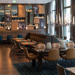 Отель Motel One Leipzig - Nikolaikirche Германия, Лейпциг - отзывы, цены и фото номеров - забронировать отель Motel One Leipzig - Nikolaikirche онлайн гостиничный бар