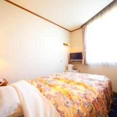 Beppu Station Hotel Беппу комната для гостей