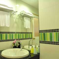 Green Harbor Hotel & Service Apartment ванная фото 2