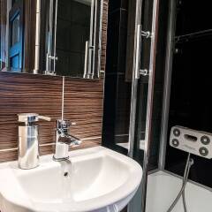 Апартаменты Downtown Apartments ванная