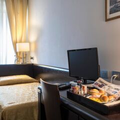 Отель Bellesuite Rome в номере