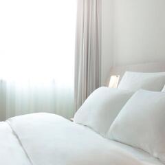 Гостиница Novotel Almaty City Center комната для гостей