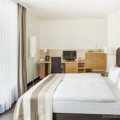 Отель IntercityHotel Wien Австрия, Вена - 3 отзыва об отеле, цены и фото номеров - забронировать отель IntercityHotel Wien онлайн комната для гостей фото 5