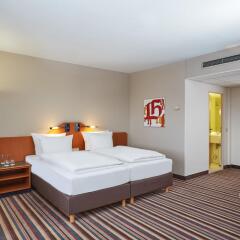 Отель Ramada Leipzig City Centre (ex.tulip Inn) Лейпциг комната для гостей фото 5