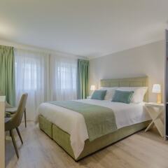 Отель Ver Belem Suites сейф в номере