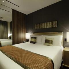 Отель Oakwood Premier Tokyo комната для гостей фото 9
